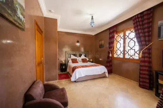 Suite Figuier — chambre aux tons terracotta, Villa Dar Moudar